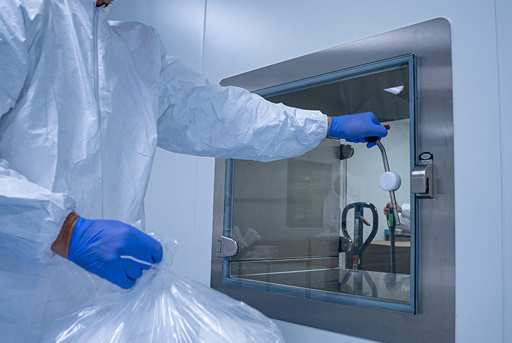 AQF Medical employee in a controlled cleanroom